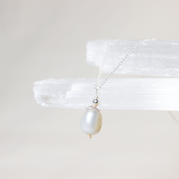 Tipa Levana (White Drop) Pearl necklace on reticulated silver cup and silver chain
